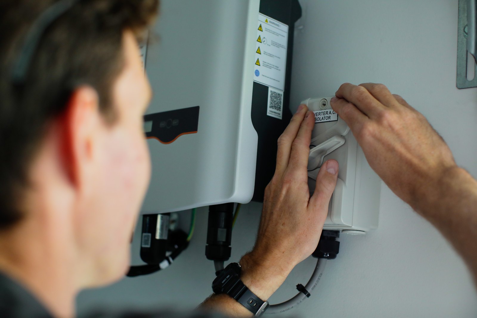 Renew Energy licensed electrician at work